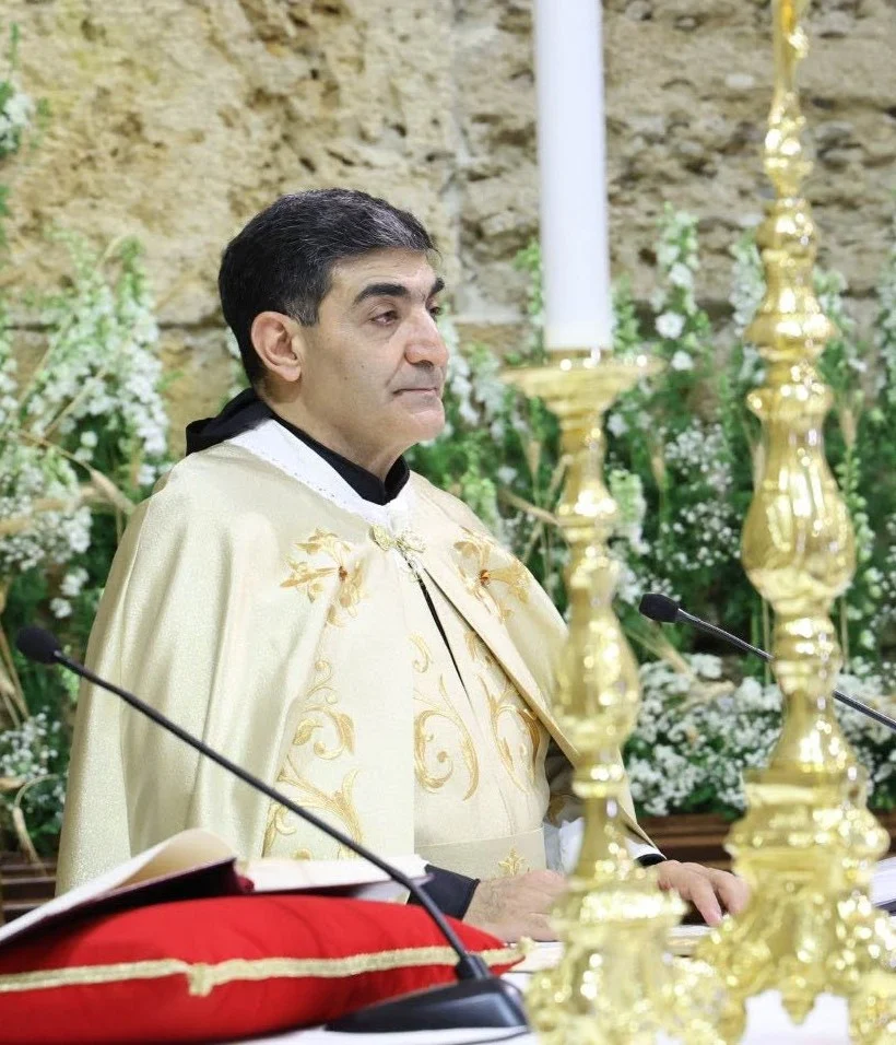 Father Simon Abboud, parish priest, at the altar of Saint John Mark during the Divine Liturgy